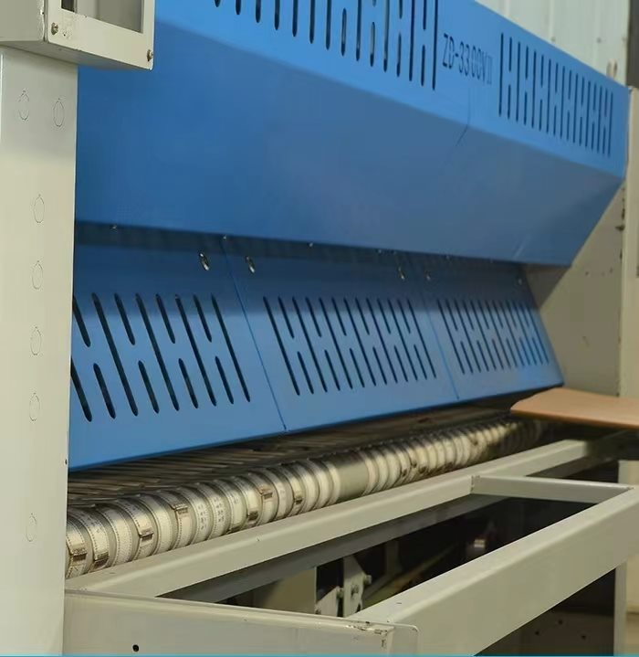Folding machine roller and belt detail
