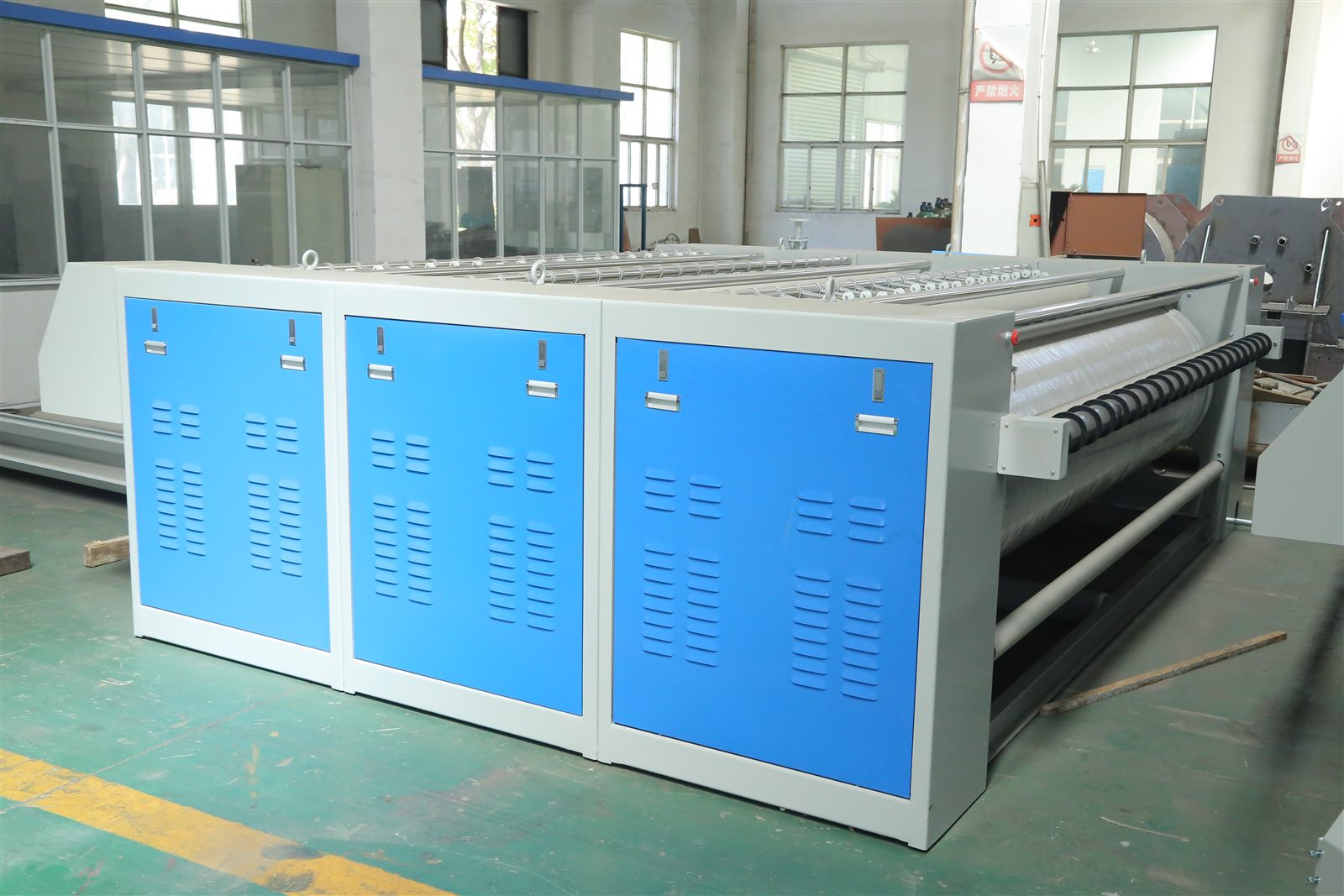 Flatwork ironer side view