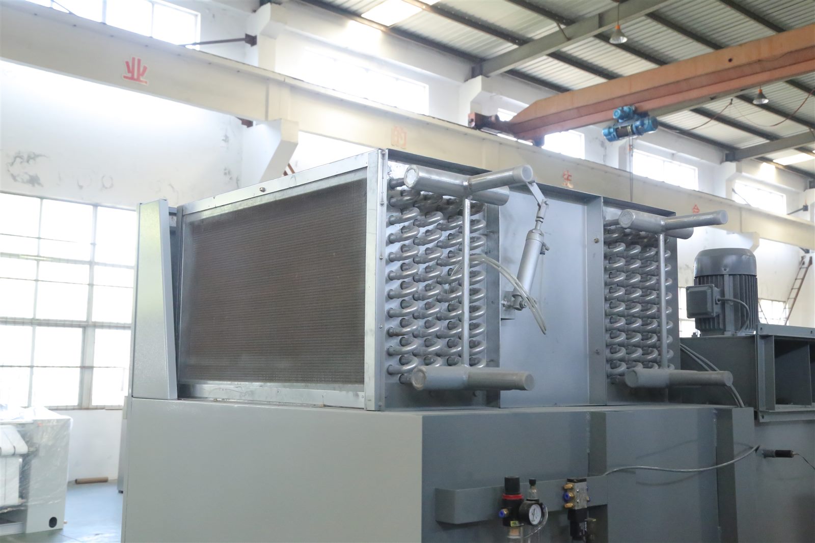 Heat exchanger of commercial tumble dryer